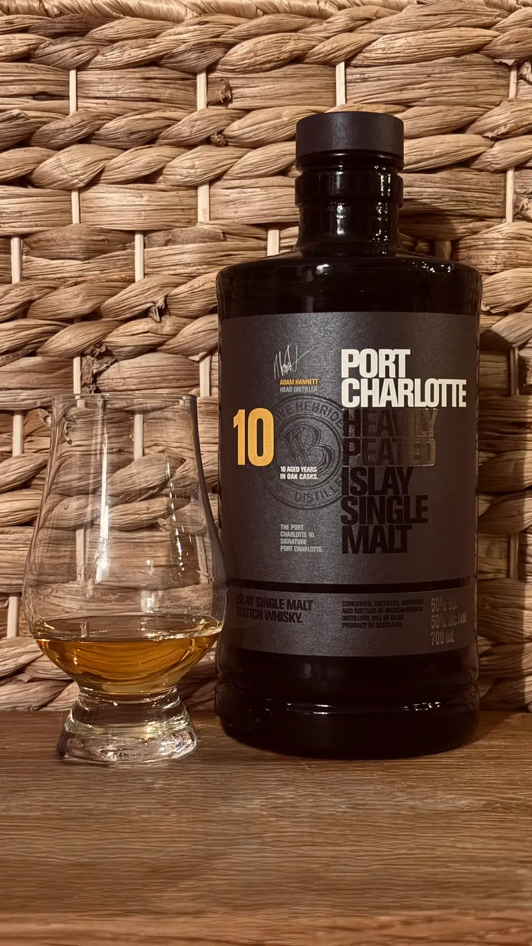 A Picture of Port Charlotte 10 and a whisky glass.